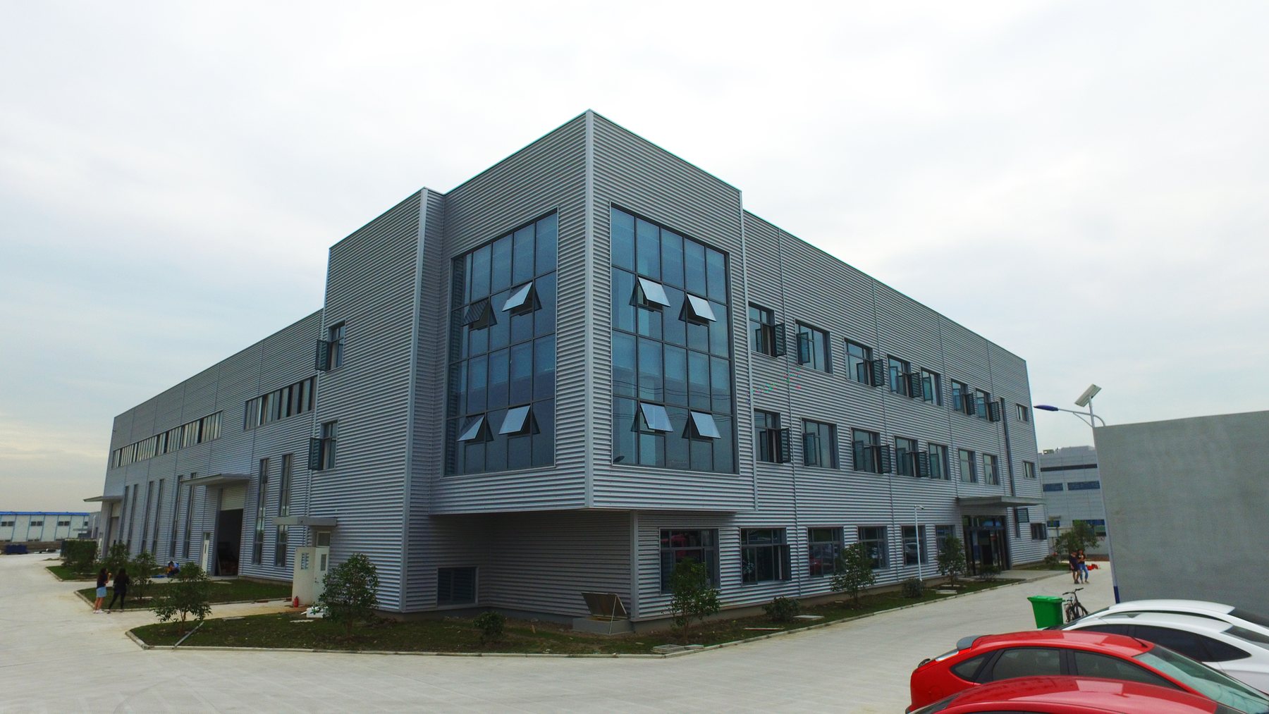 Completed multi-story industrial building exterior